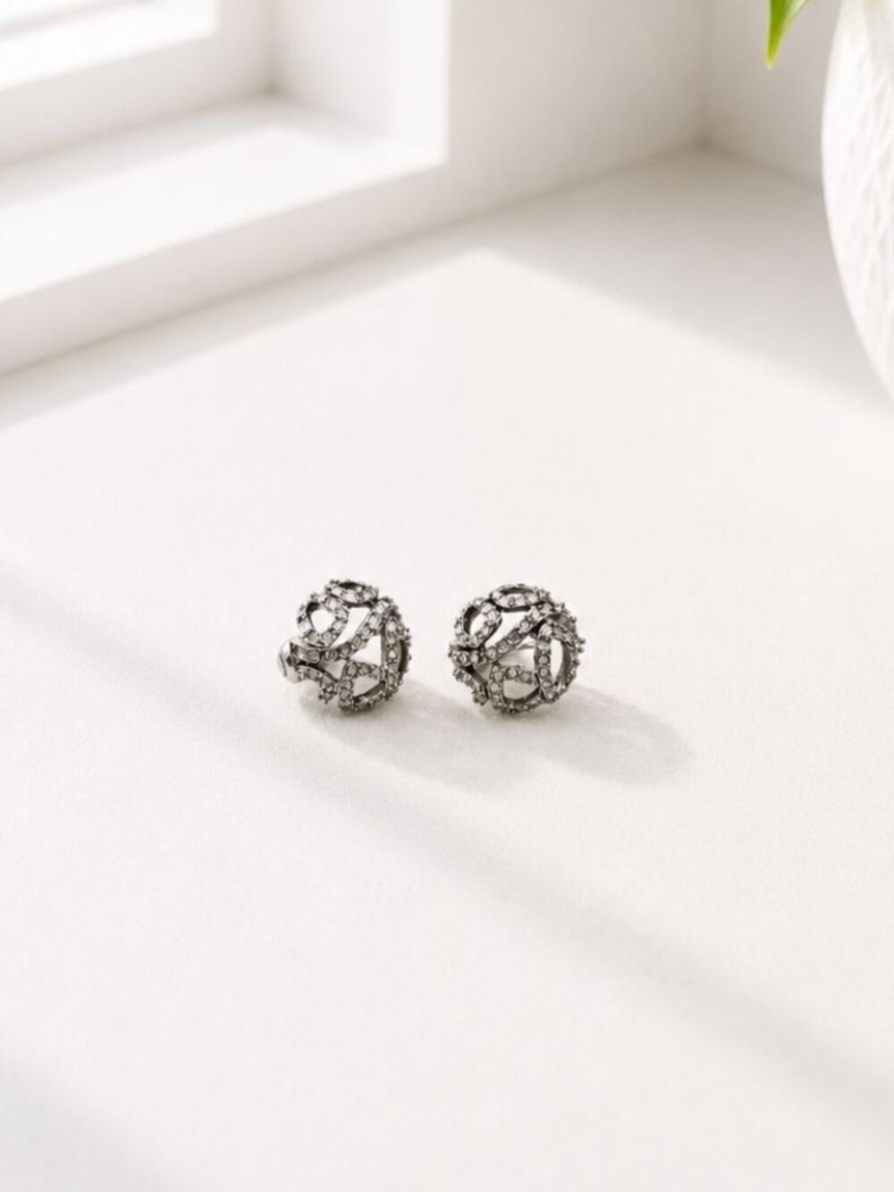 Vintage Rhinestone Silver-Tone Clip-On Earrings With Intricate Openwork Design